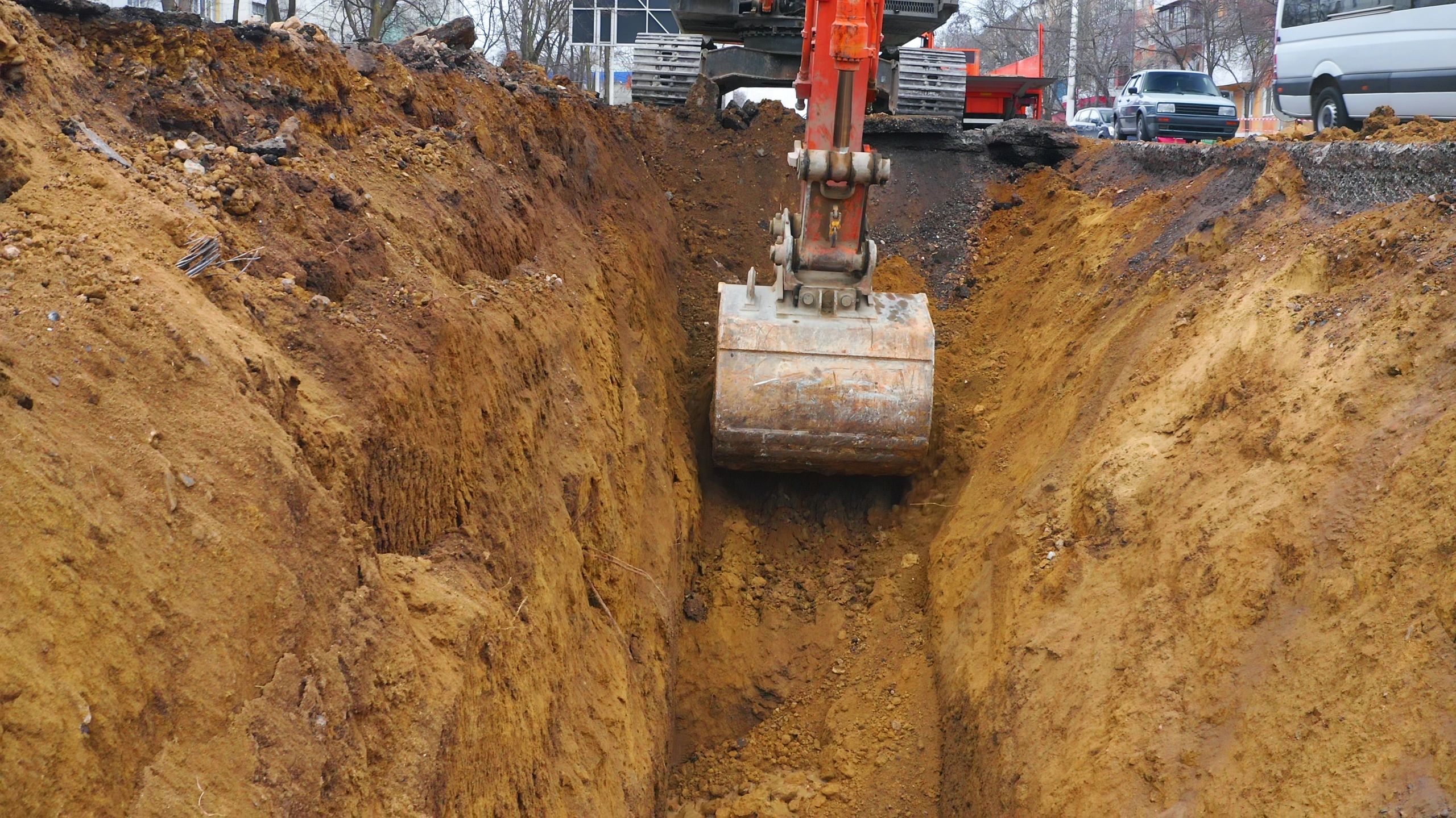 Excavator trenching for groundwork